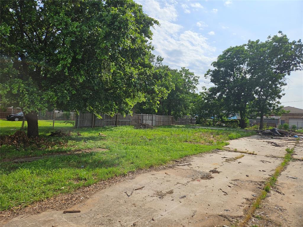 a view of backyard with green space