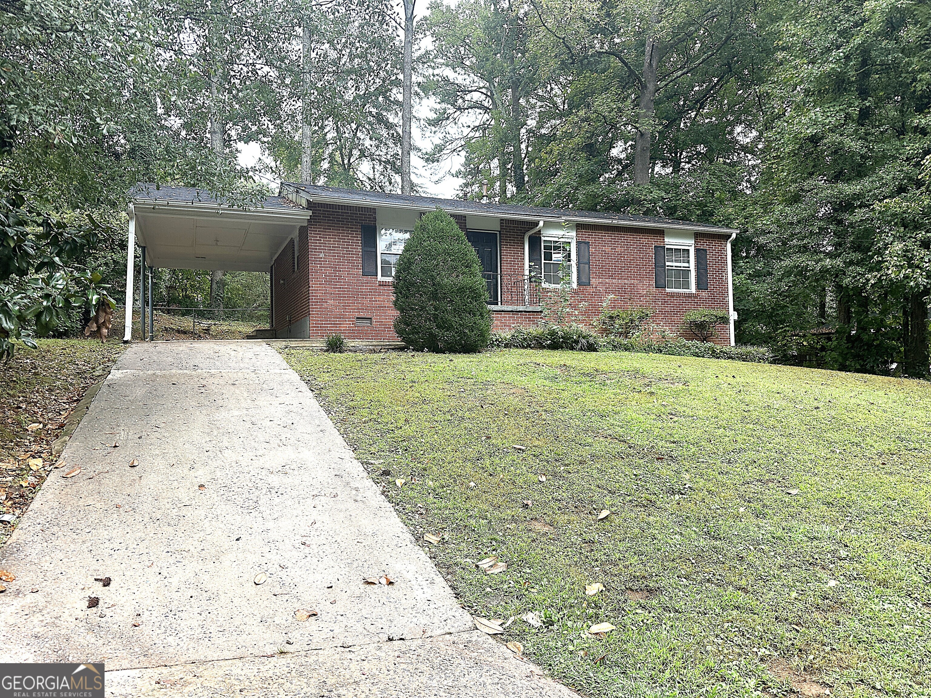 front view of a house with a yard