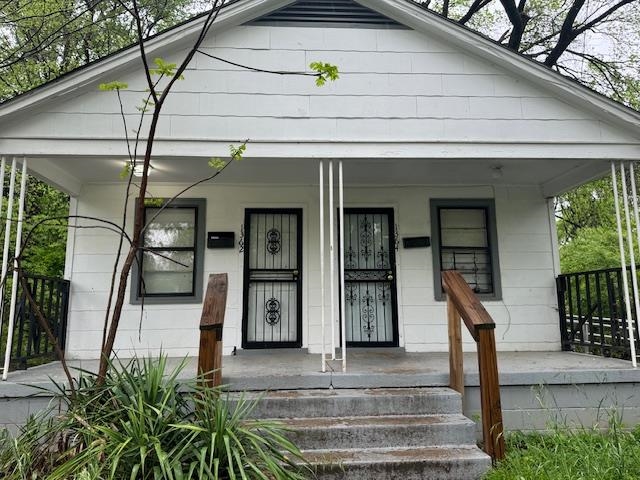 a front view of a house with garage