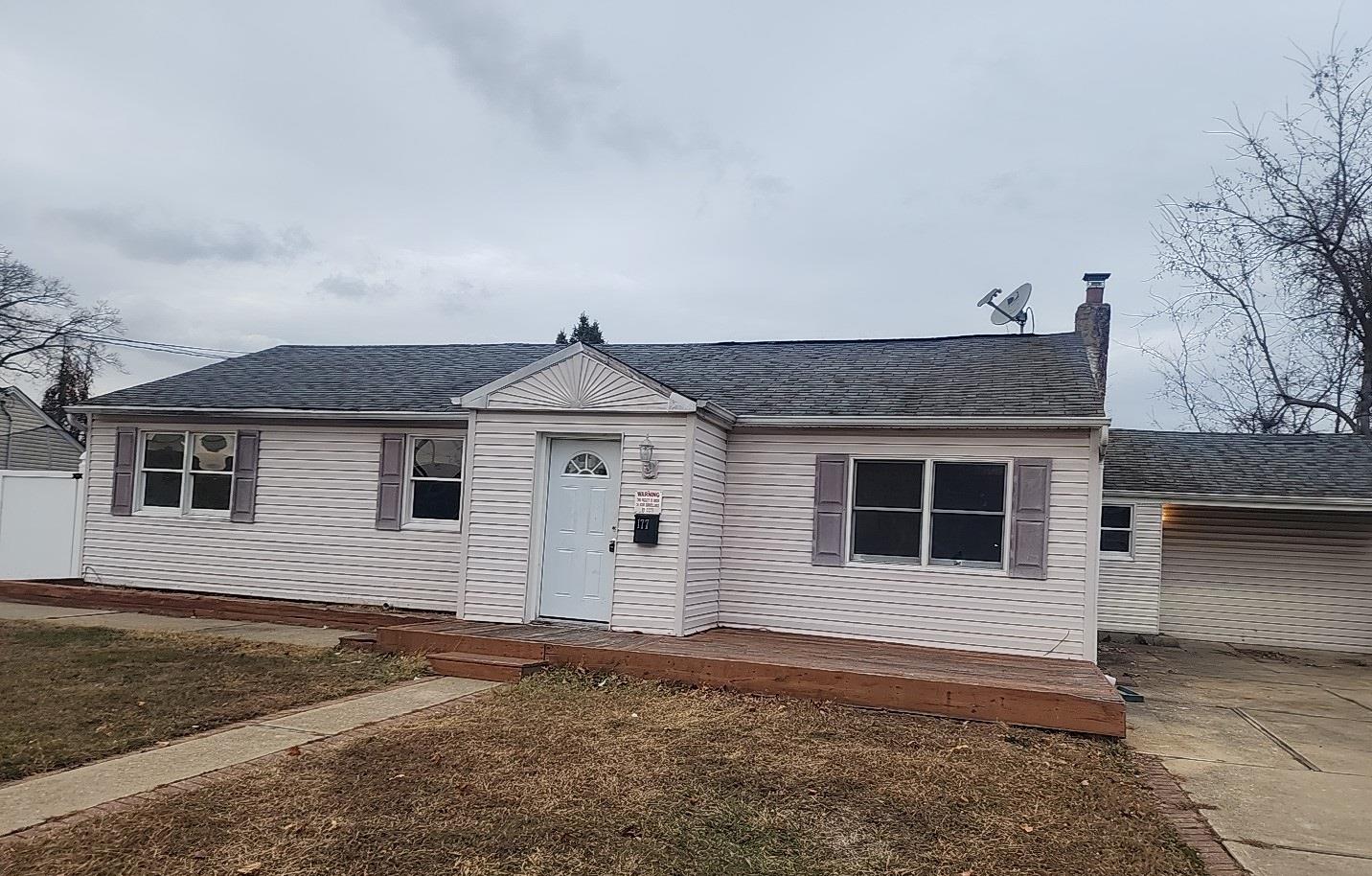 a house that has a window in front of it