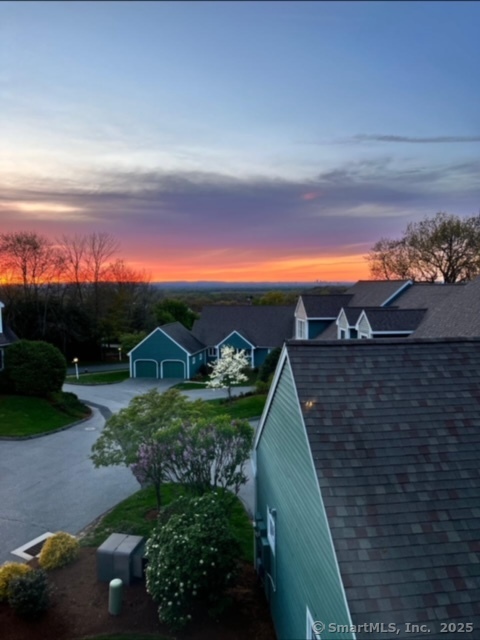 a view of a yard in front of the house