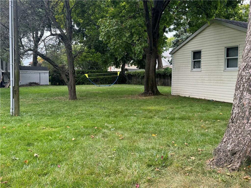 View of yard featuring a storage shed