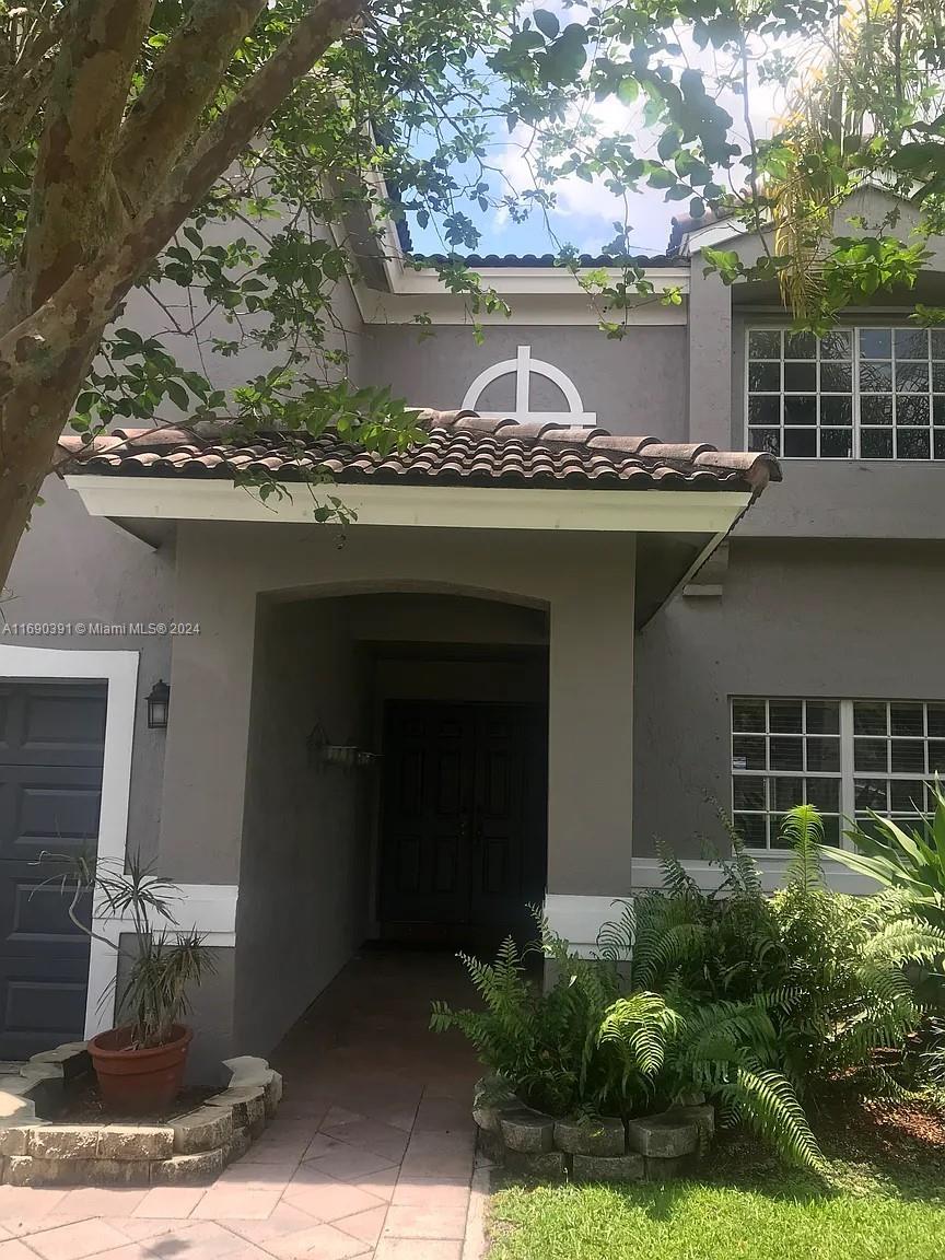 a view of a house with a balcony