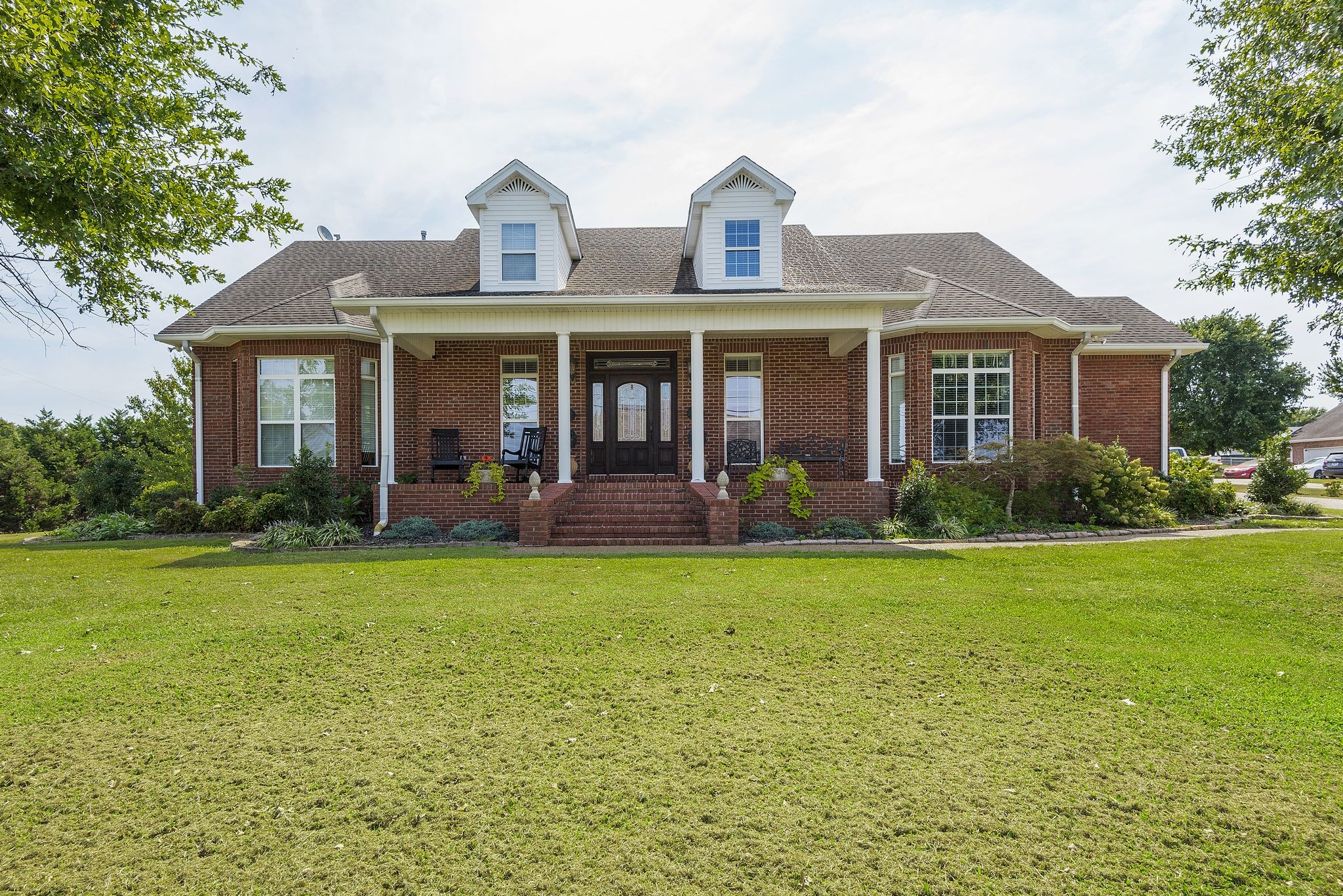 a view of a house with a garden