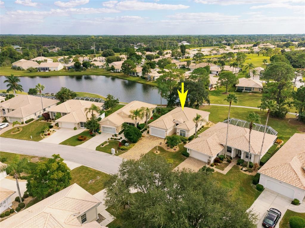 an aerial view of a houses with outdoor space