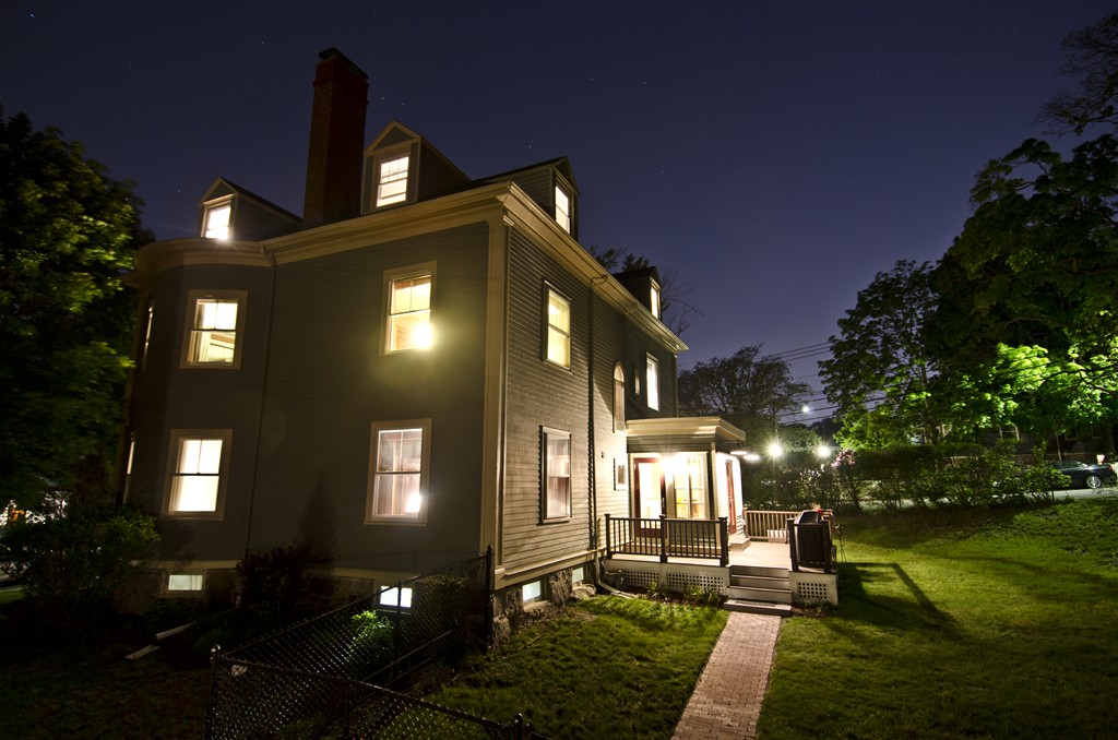 a front view of a house with a yard