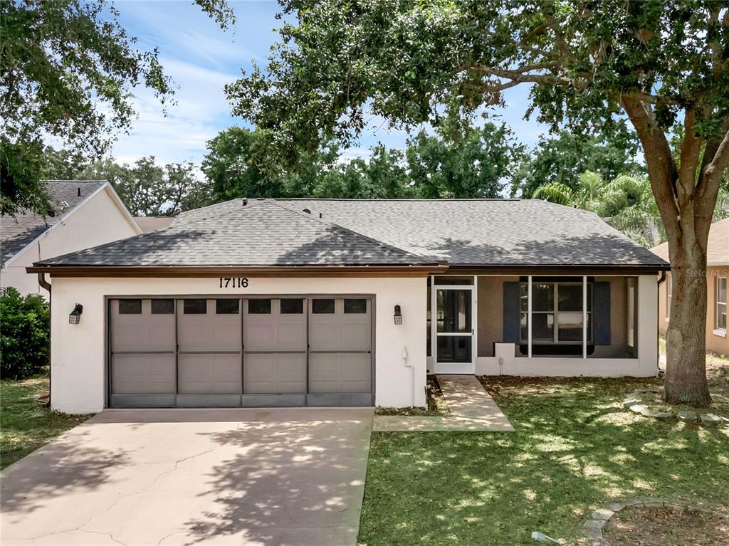 front view of a house with a small yard