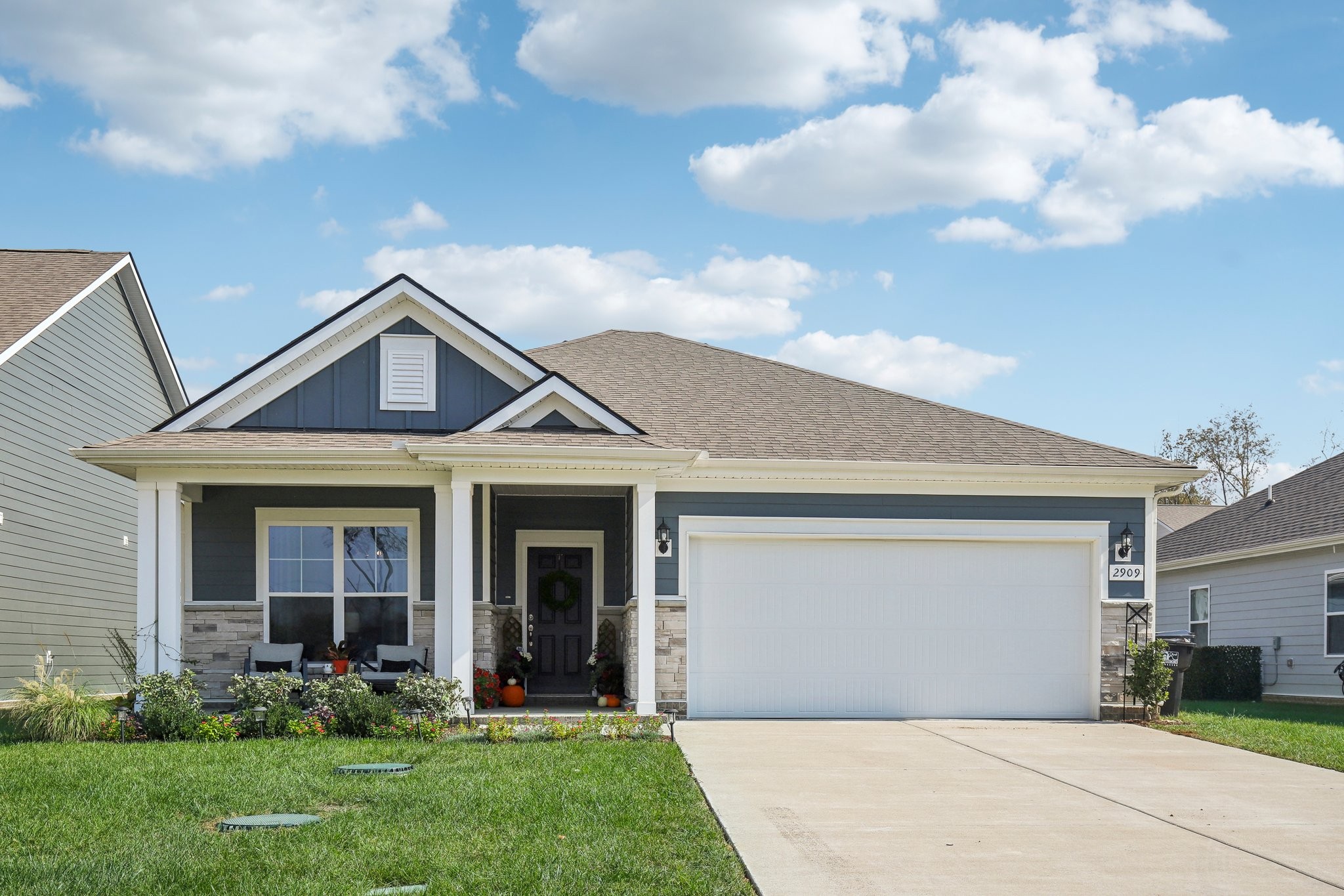 front view of a house with a yard