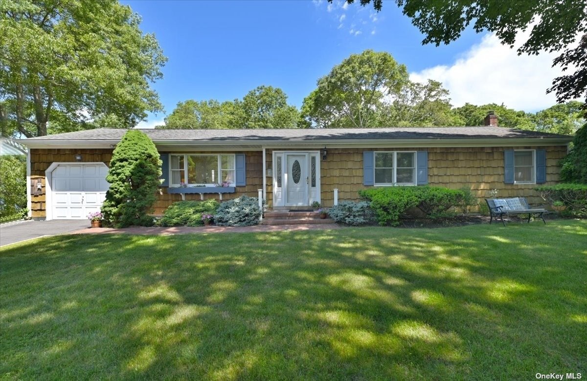 front view of house with a yard