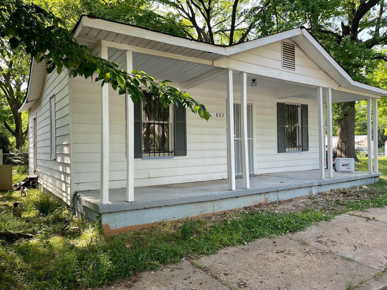 Exterior space with covered porch