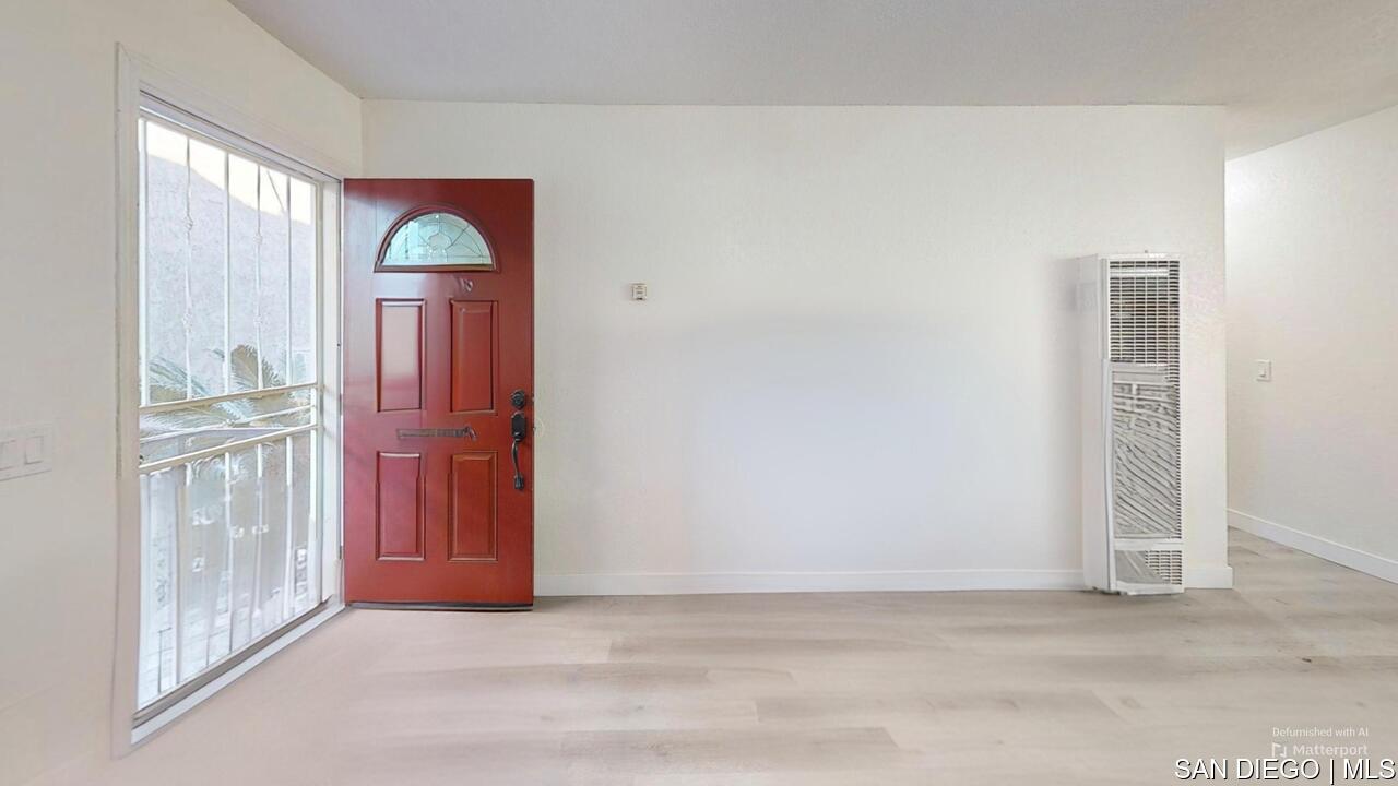 a view of front door with a bathroom