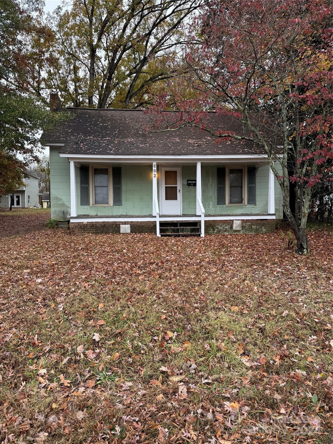 front view of house with a yard