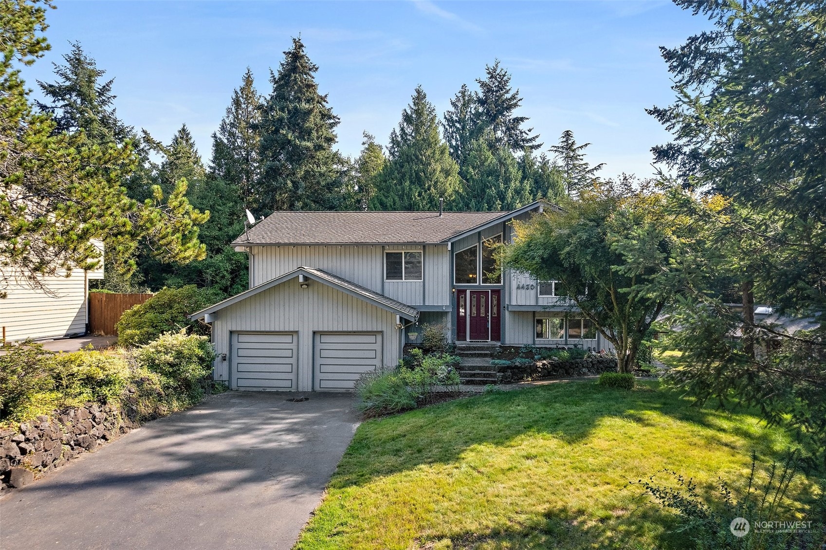 a house view with a garden space