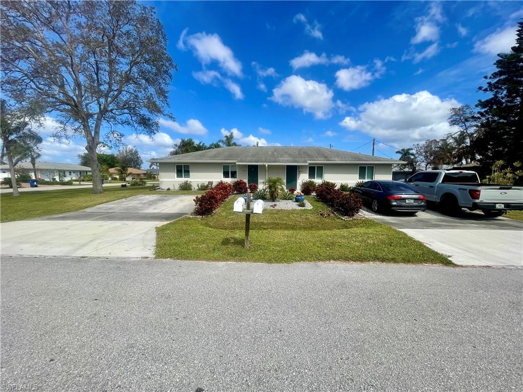 Single story Duplex with a beautiful front yard