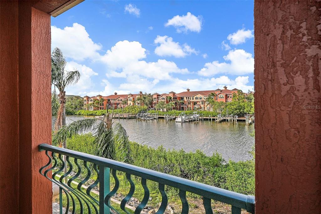 a view of a lake from a balcony