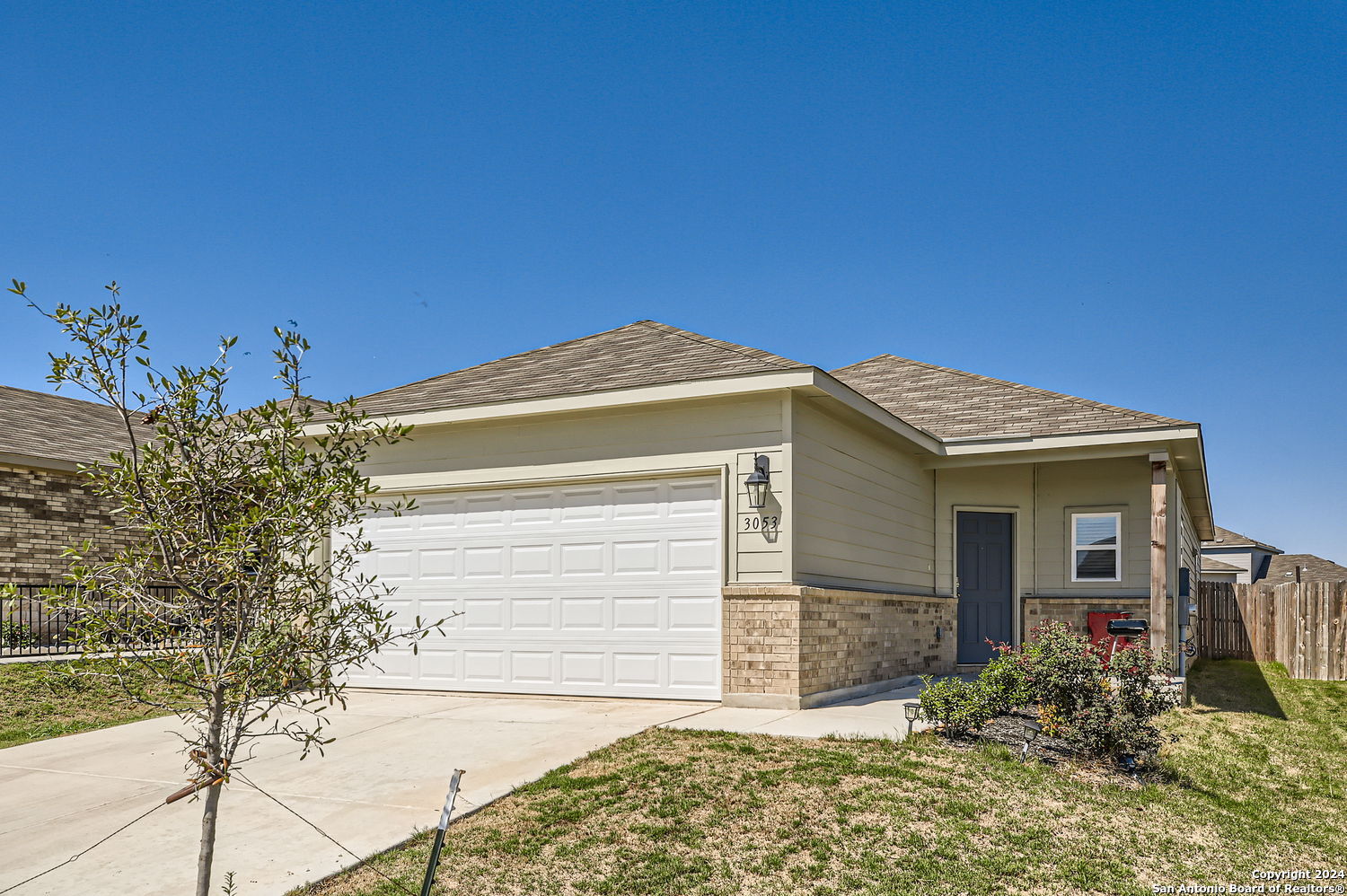 a front view of house with yard