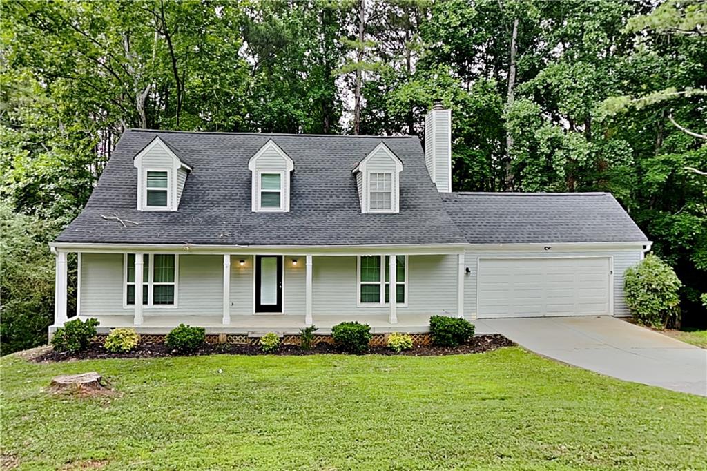 front view of a house with a yard