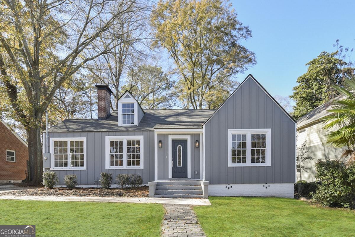 front view of a house with a yard