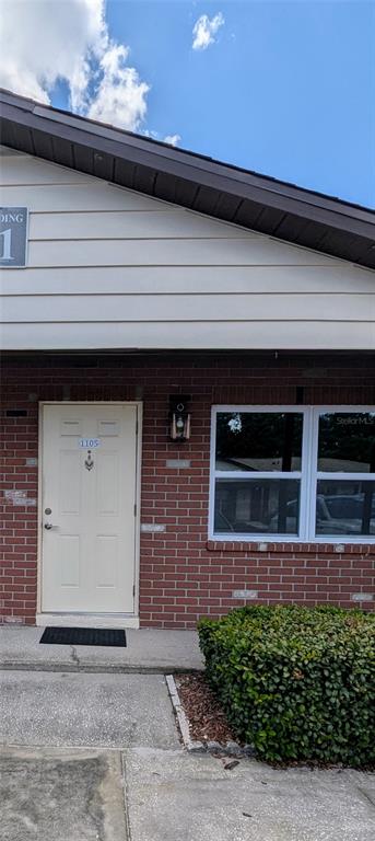 a front view of a house with garage