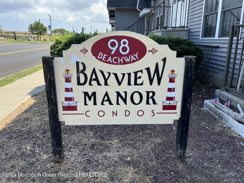 a sign board with a yard