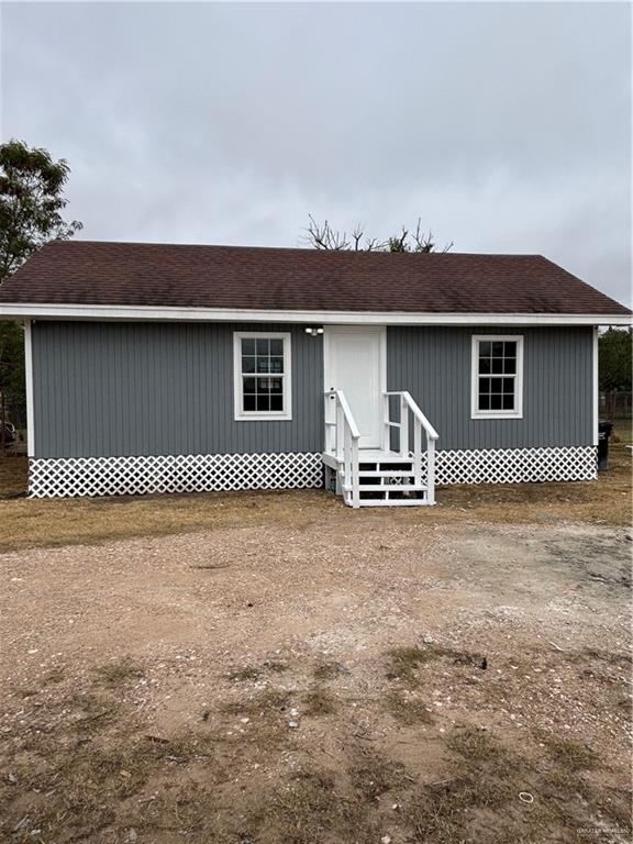 a house with yard and a space