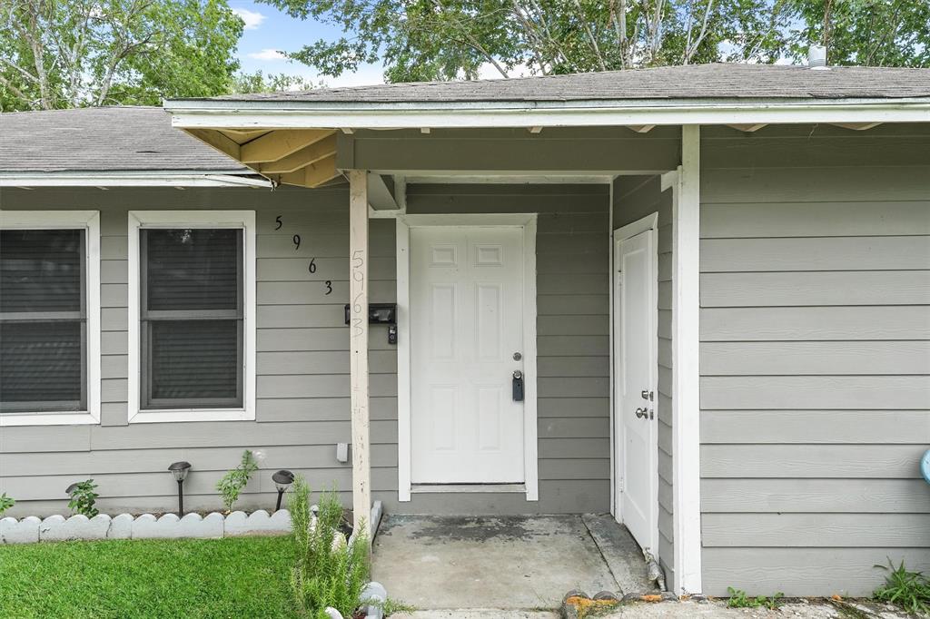 a front view of a house with a garage