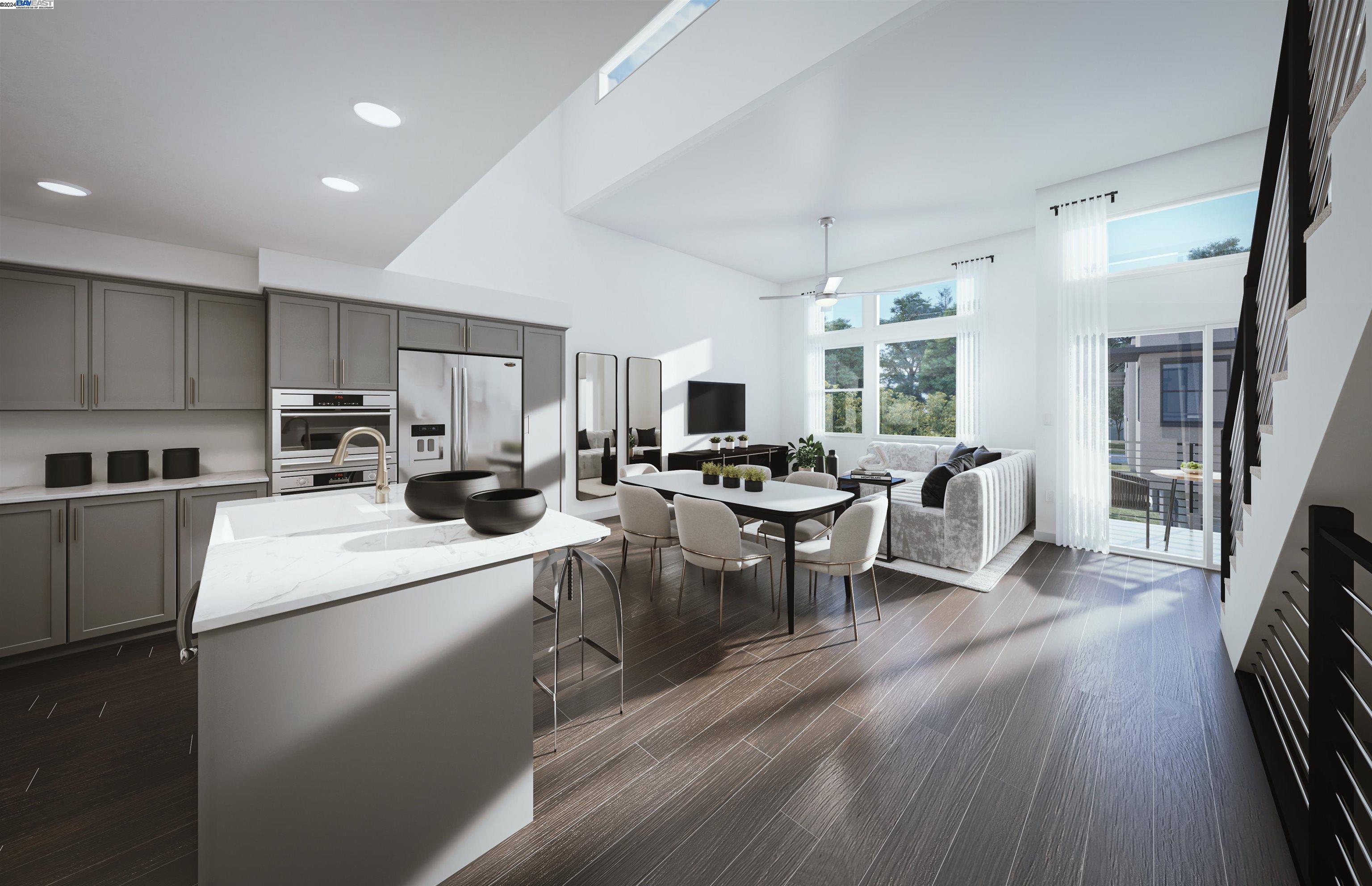 a open kitchen with sink cabinets and wooden floor