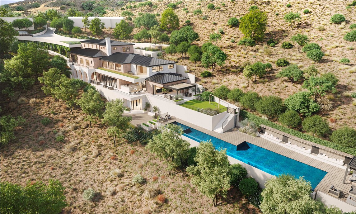 an aerial view of residential house with outdoor space