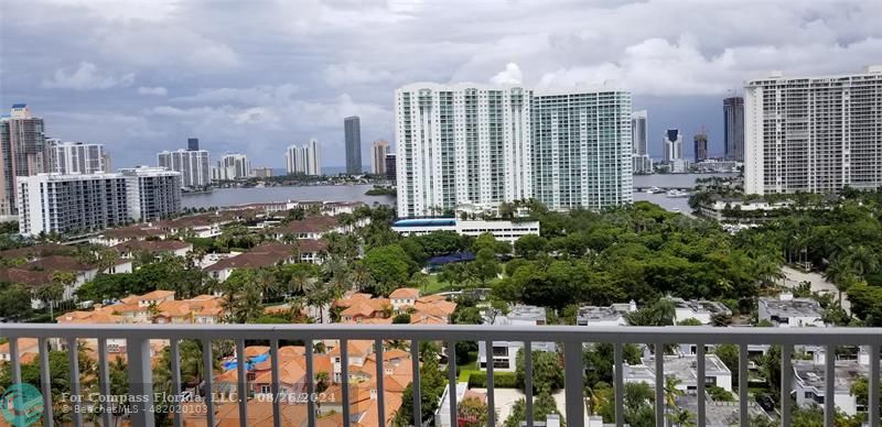 a view of a city with tall buildings