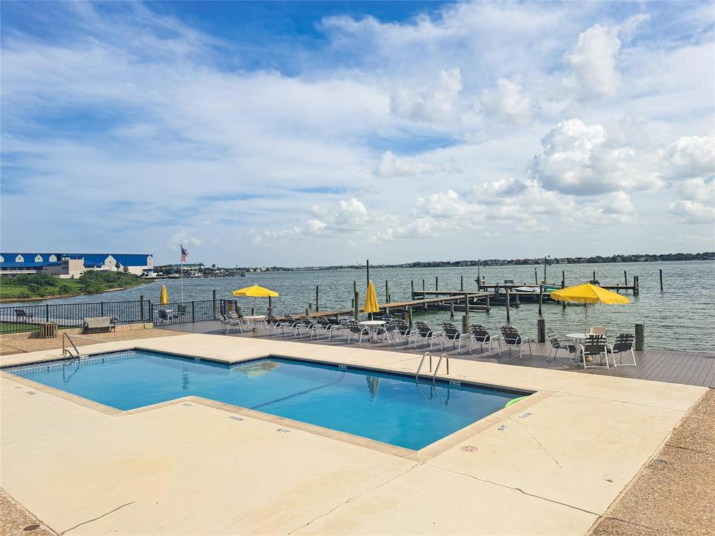 Enjoy the saltwater pool as you look out at the boats on Clear Lake.