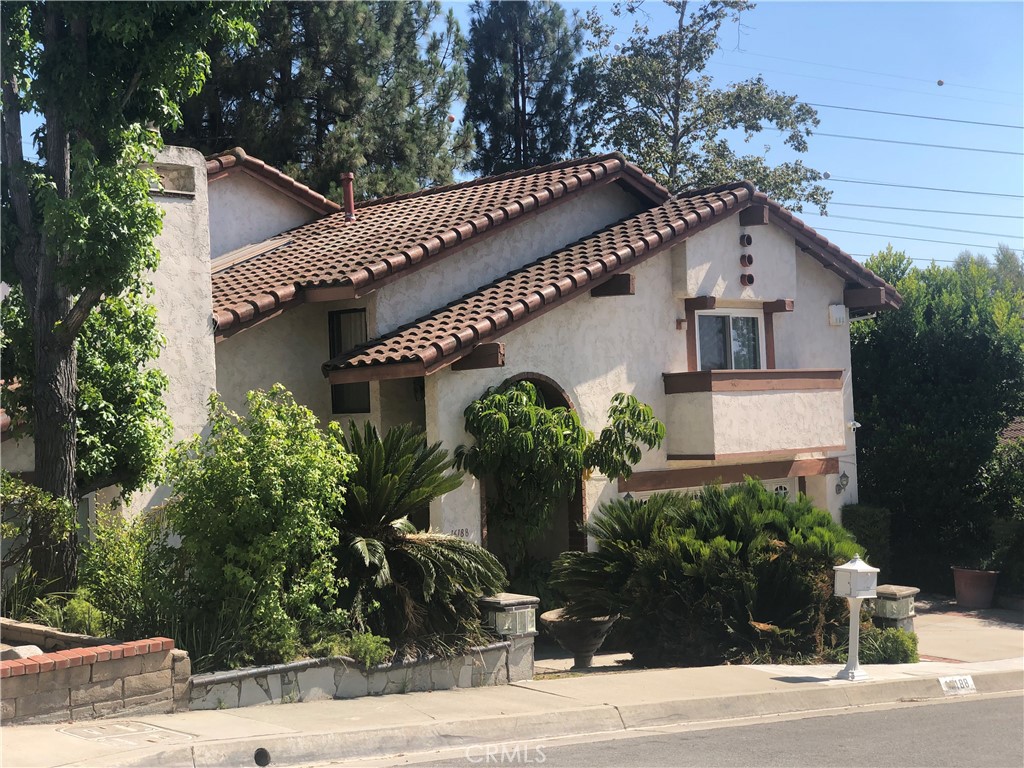 a house view with a garden space