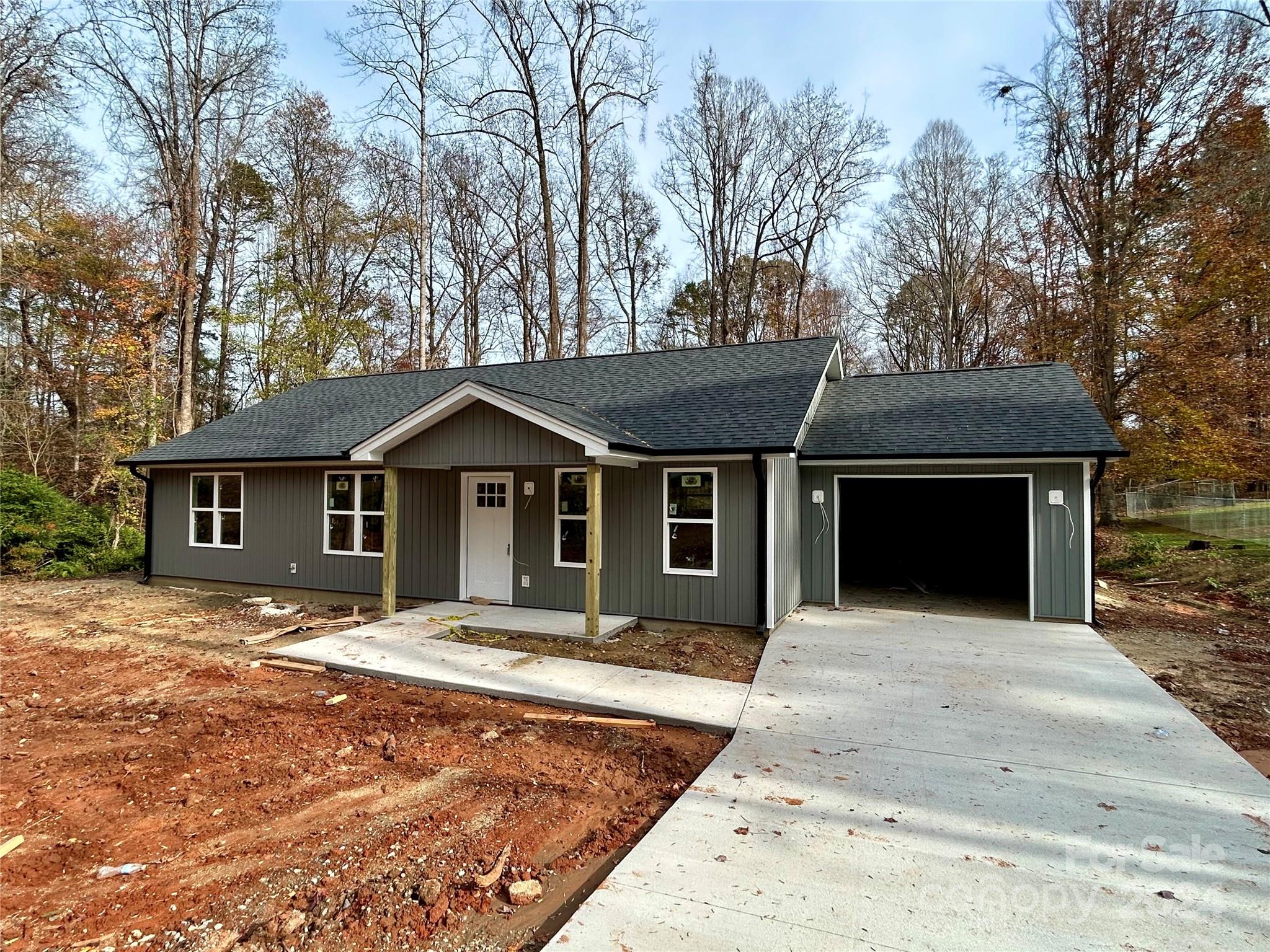 a front view of a house with yard