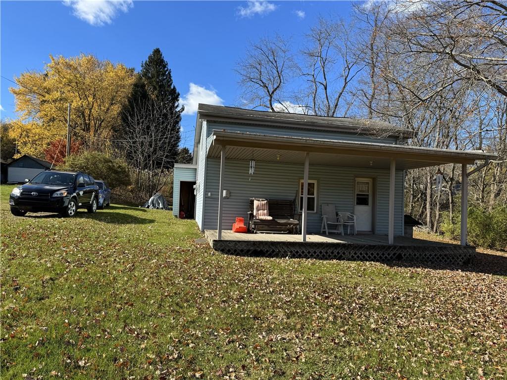 a view of a house with a porch