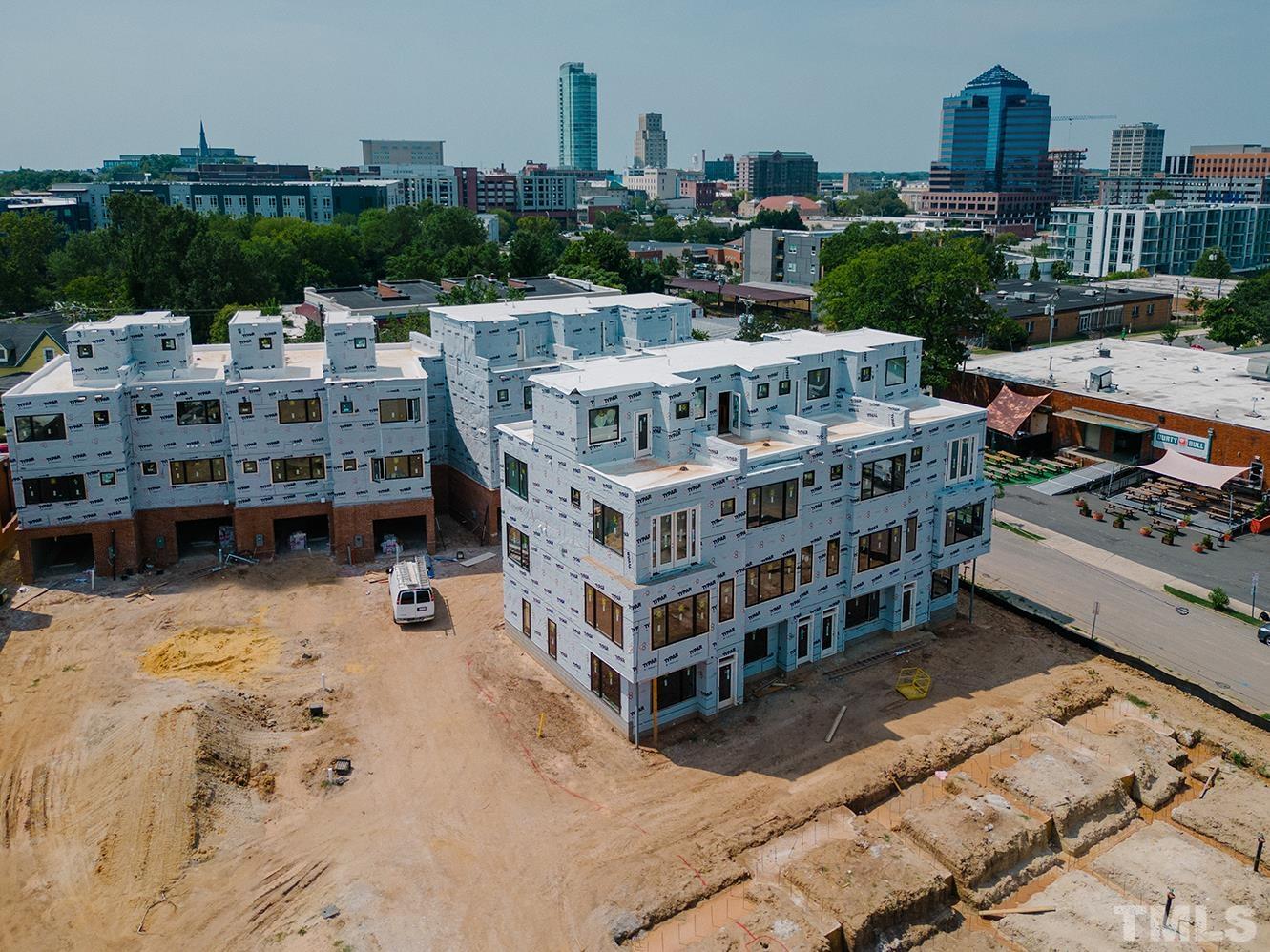 a view of a building with a yard