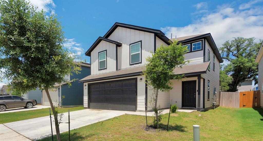 View of the covered walkway, and fully fenced backyard!