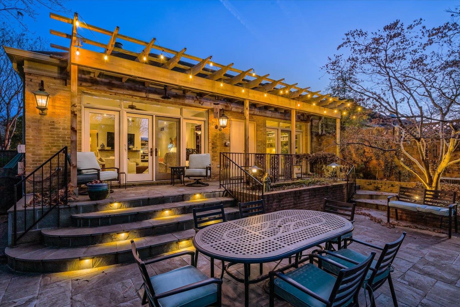 a view of a chairs and table in the patio