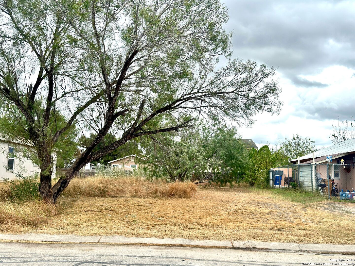 a house with trees in the background