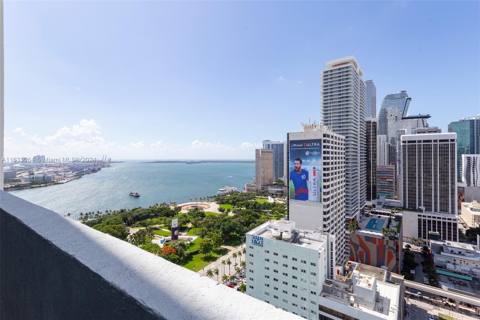 a view of city with tall buildings