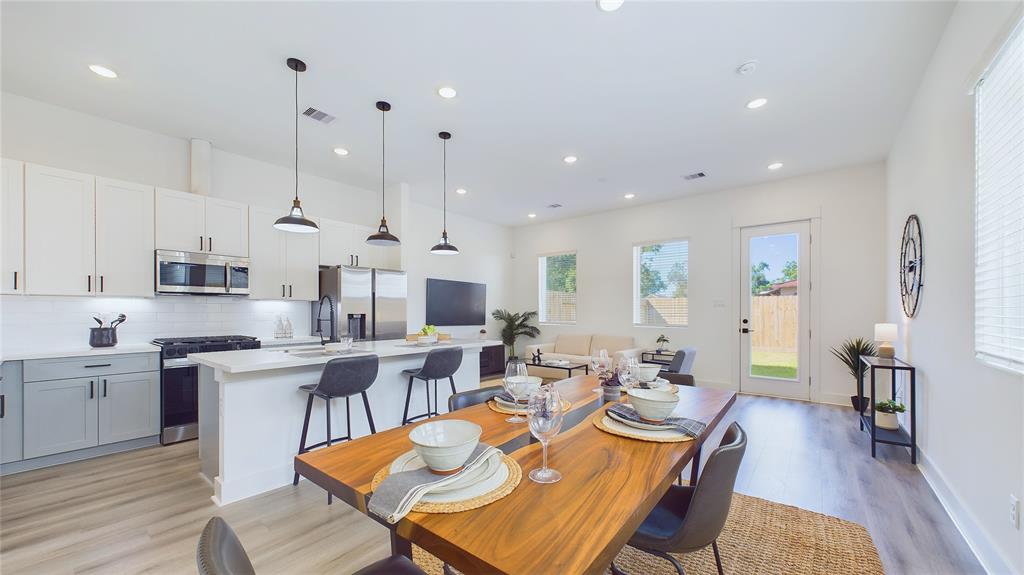 Open concept living area on the first floor - three bedrooms and two full baths on the second floor.