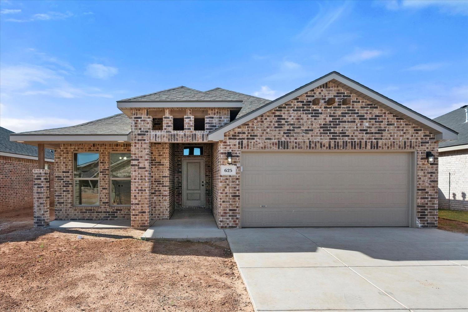 a view of a house with a garage