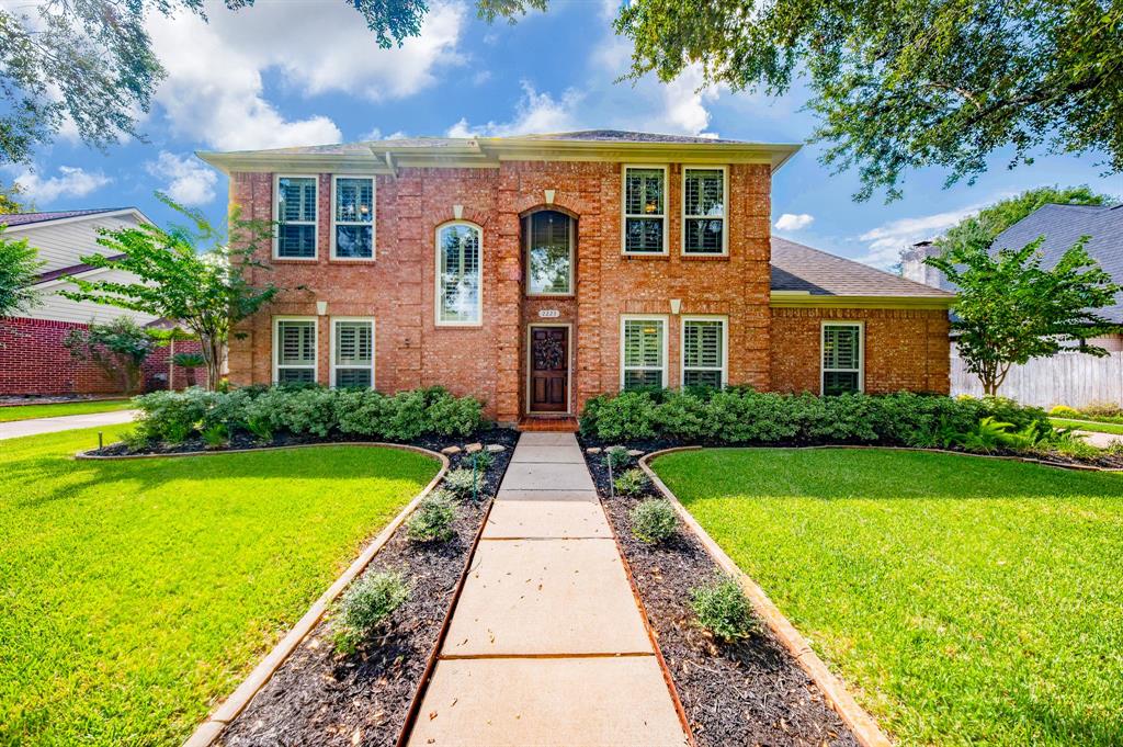 Welcome Home to this Amazing 4 Bedroom Home with a Guest Quarters that Makes Bedroom 5.