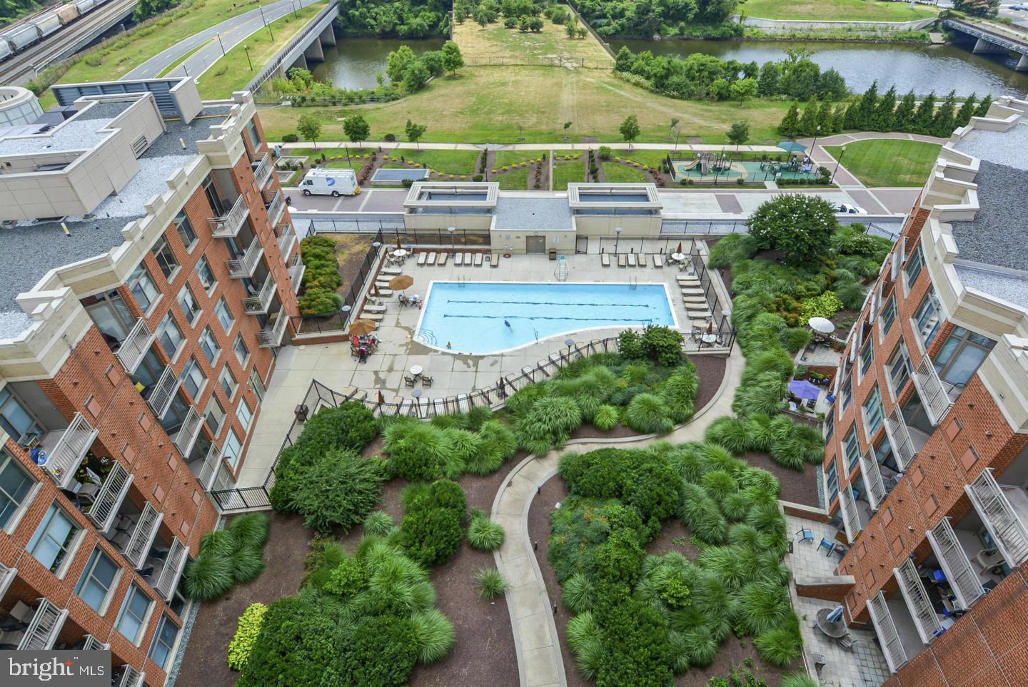 an aerial view of a house with outdoor space pool patio and outdoor seating