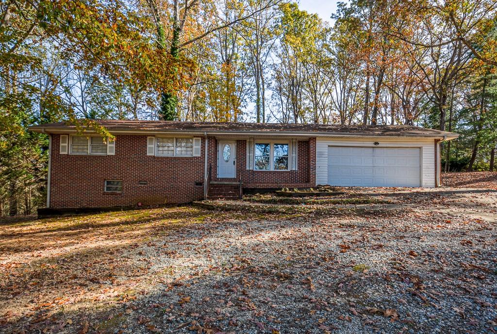 a house with trees in front of it