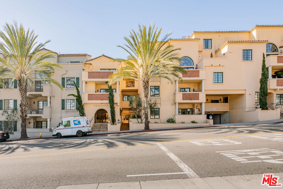 a view of a building with a street