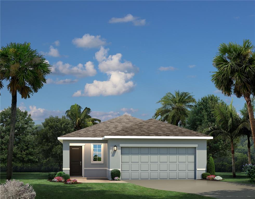 a front view of a house with a garden and tree