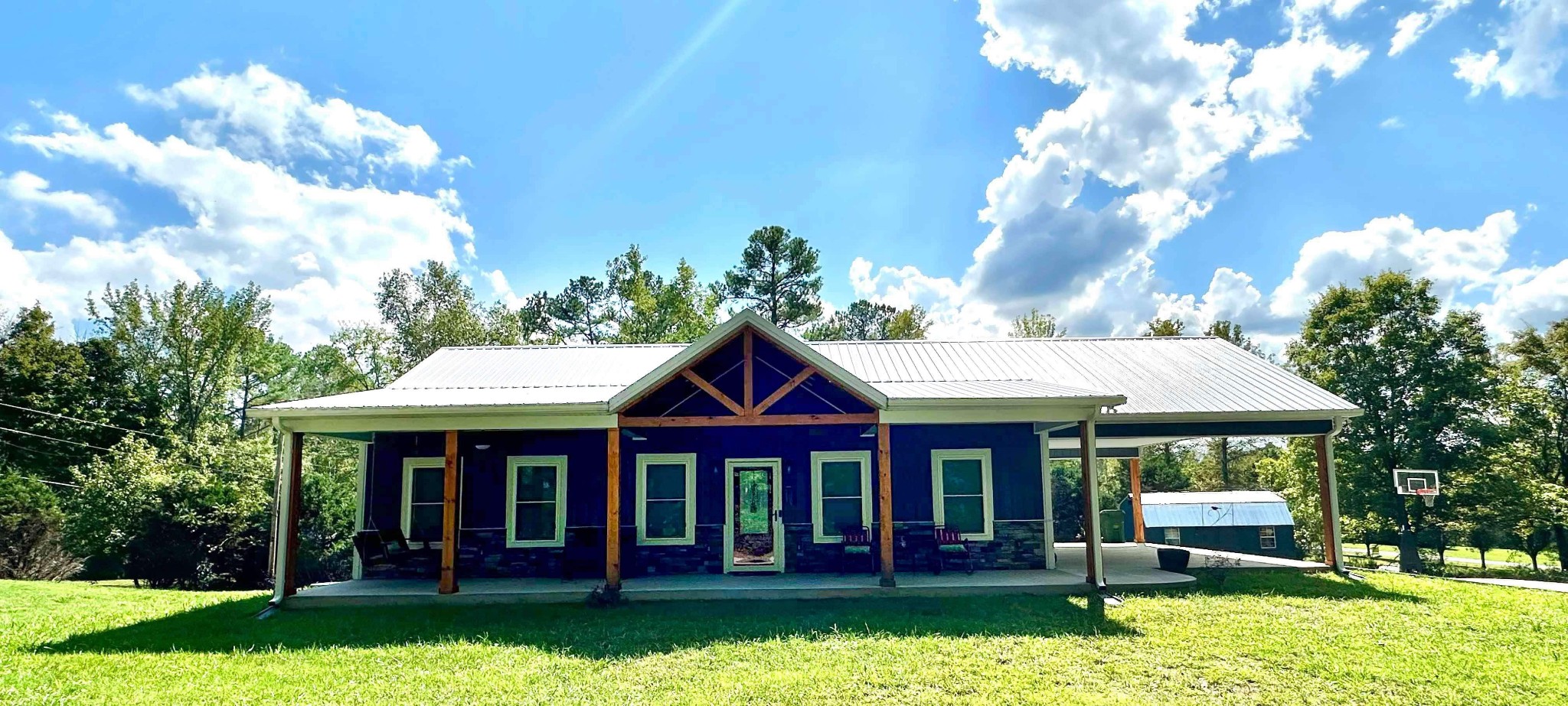 front view of a house with a yard