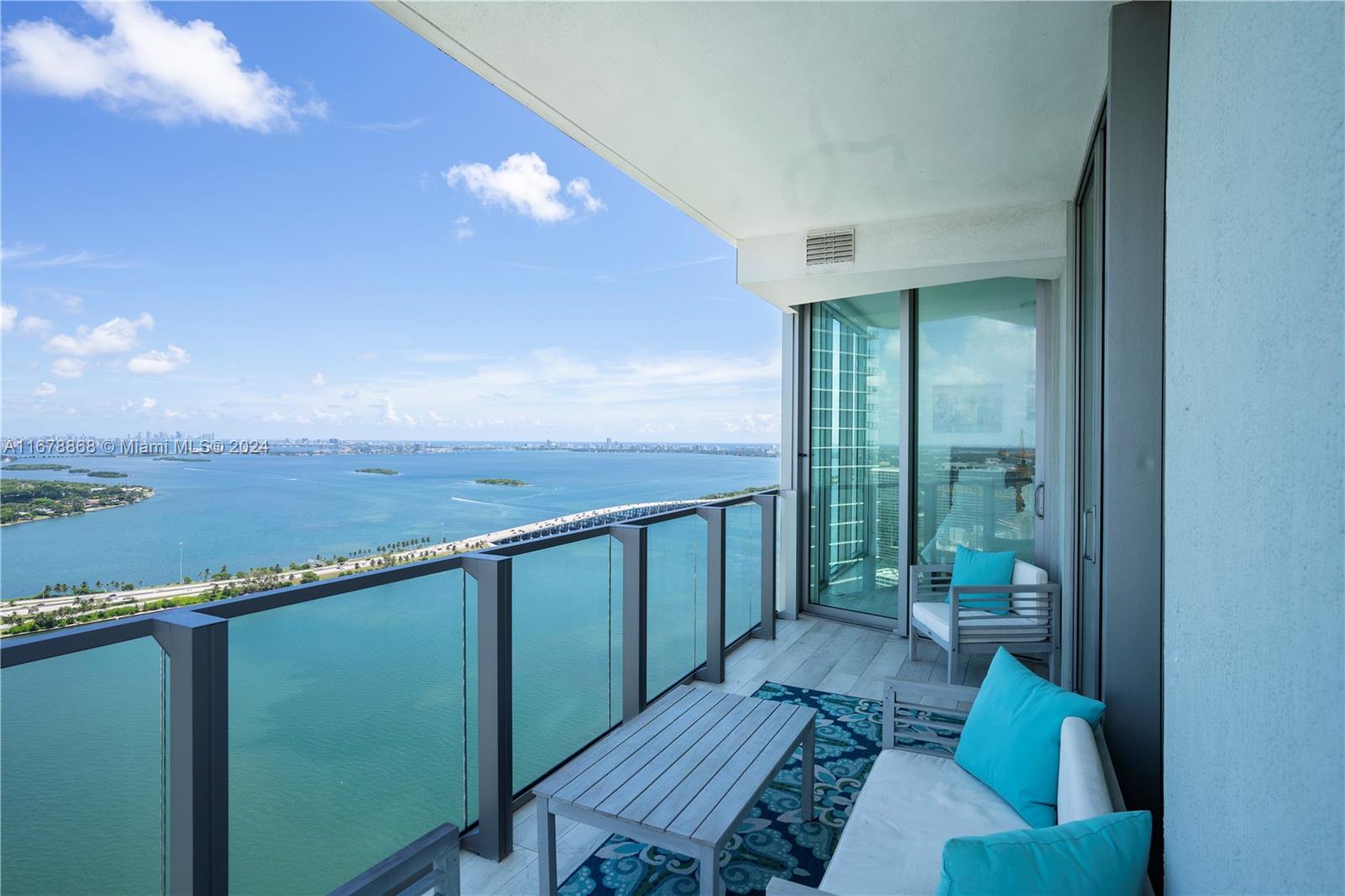 a view of a balcony with chairs