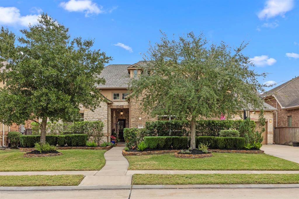 This home located in a gated section has no back neighbors.