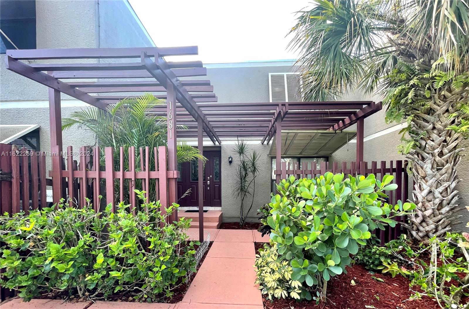 a view of a backyard with plants