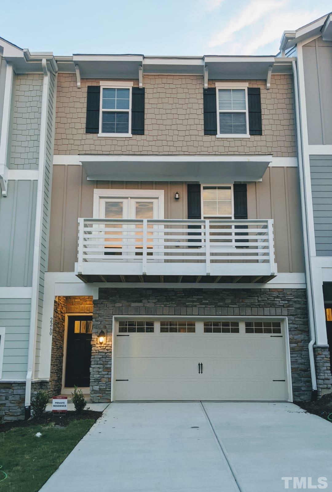 a view of a house with a balcony